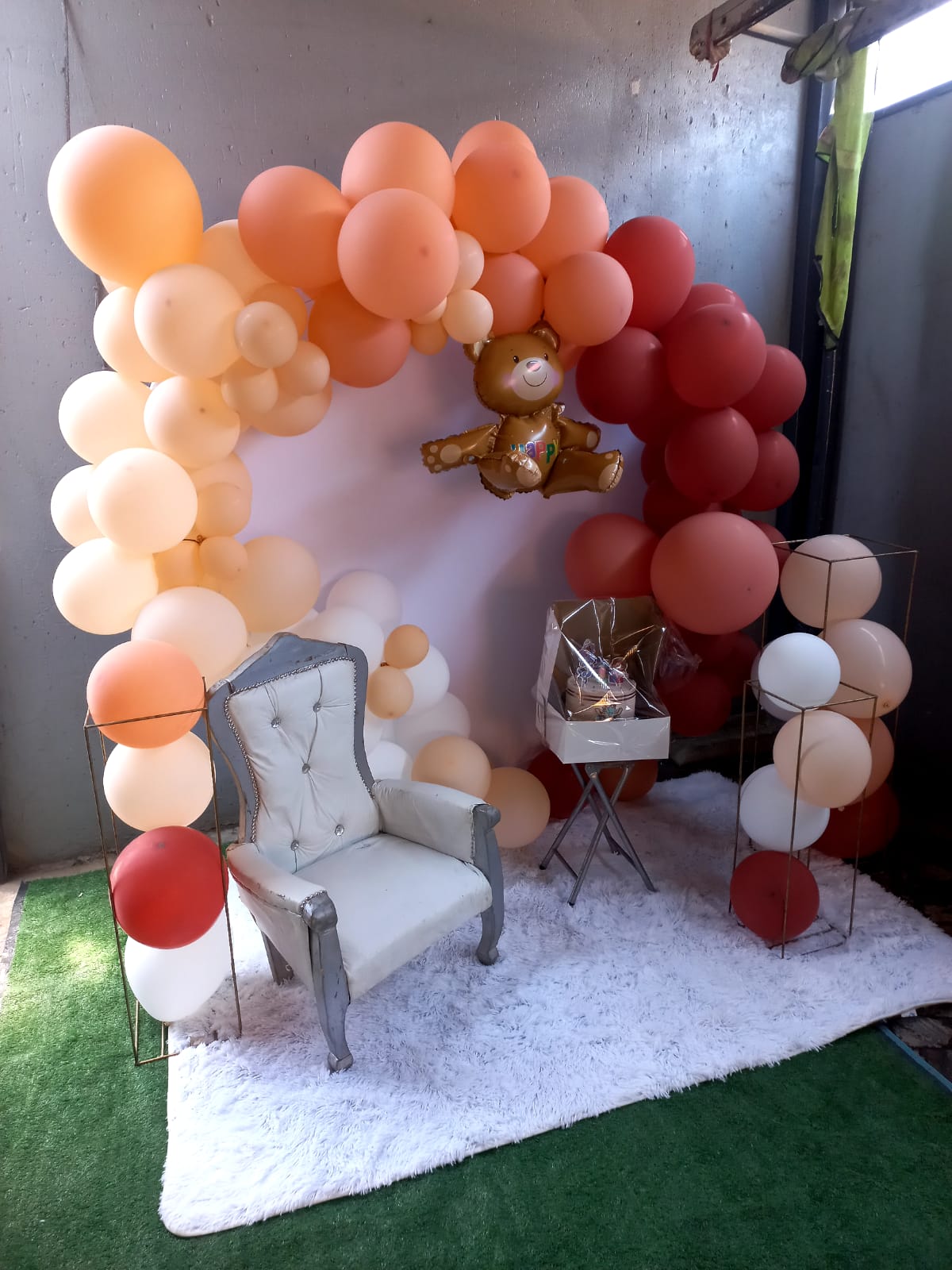 Peach and red teddy bear themed kids party backdrop